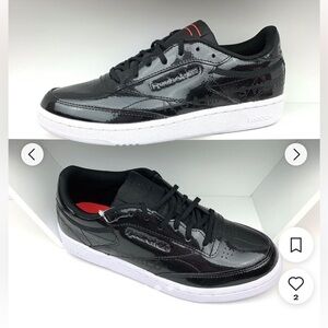 Reebok classic black patent leather “It’s a Man’s World” sneakers, women’s 7.